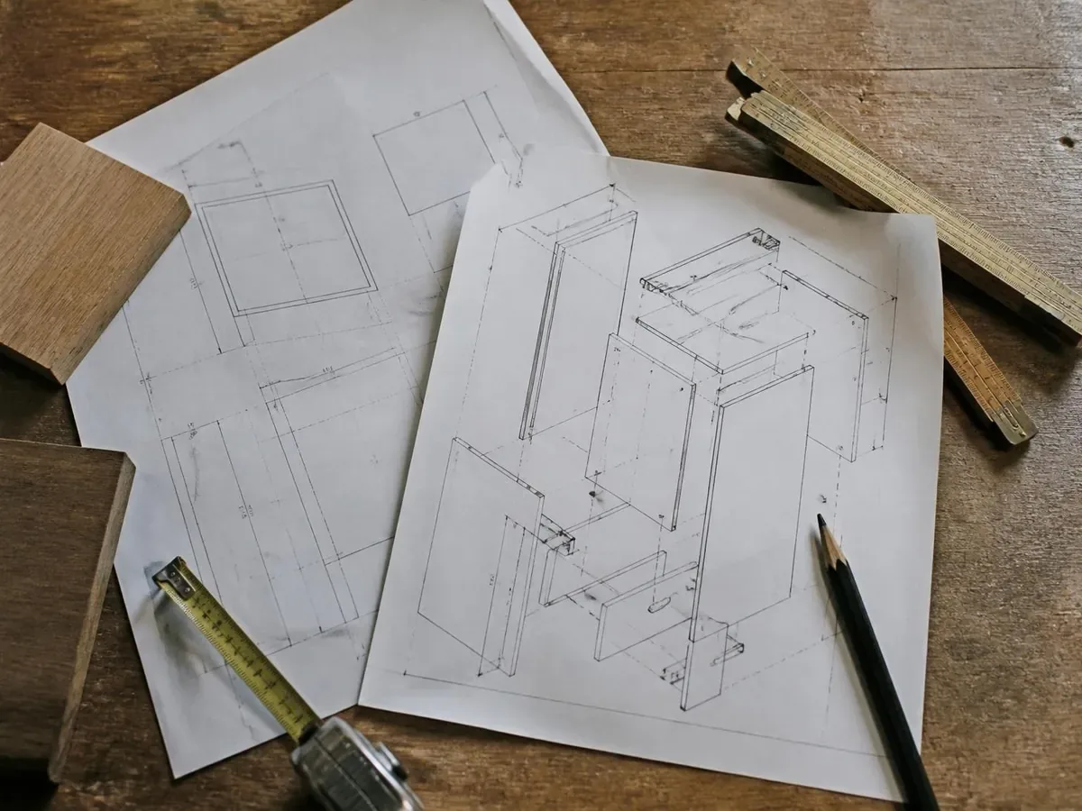 Pages d'un plan Houtcraft : plan coté, vue 3D et notice de montage